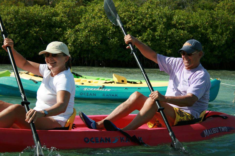 Antigua Paddles couple enjoying the ride