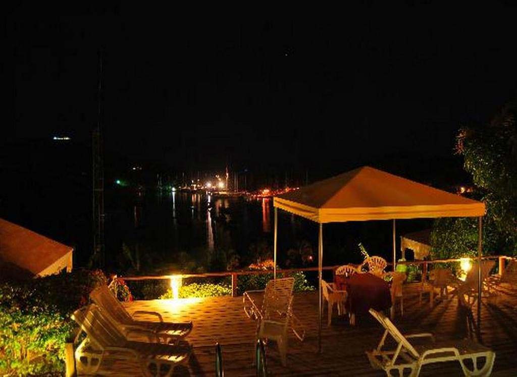 Ocean Inn pool deck harbour view at night